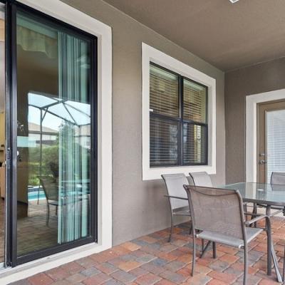 Screened, covered patio Retreat At ChampionsGate  